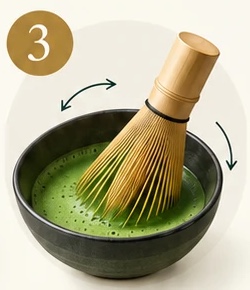 Whisking matcha with a bamboo whisk